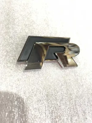 Volkswagen R Uyumlu Logo (Tekli)DRS Tuning kalitesiyle tanışın! Özel olarak Universal  model araçlar için üretilen bu ürün, otomobilinizin hatlarına sportif ve 