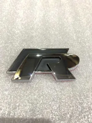 Volkswagen R-Line Uyumlu LogoDRS Tuning kalitesiyle tanışın! Özel olarak Universal  model araçlar için üretilen bu ürün, otomobilinizin hatlarına sportif ve din
